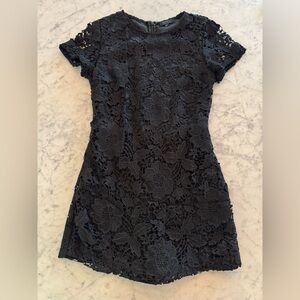 SEN floral skort romper with pockets in Black Size XS